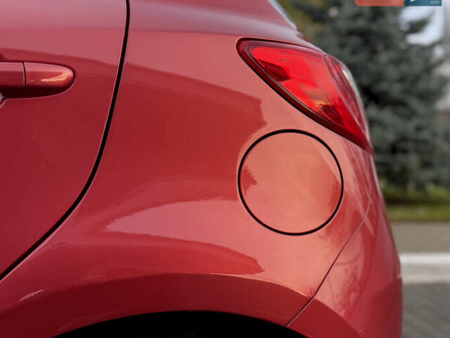 Червоний Мазда 2, об'ємом двигуна 1.5 л та пробігом 138 тис. км за 6800 $, фото 13 на Automoto.ua