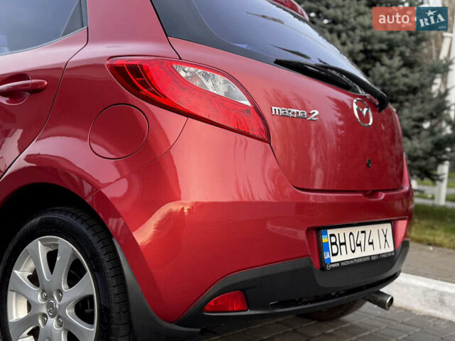 Червоний Мазда 2, об'ємом двигуна 1.5 л та пробігом 138 тис. км за 6800 $, фото 6 на Automoto.ua