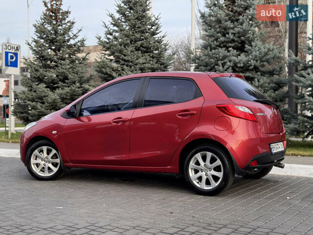 Червоний Мазда 2, об'ємом двигуна 1.5 л та пробігом 138 тис. км за 6800 $, фото 16 на Automoto.ua