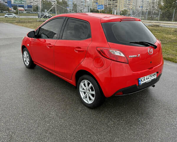 Красный Мазда 2, объемом двигателя 1.5 л и пробегом 165 тыс. км за 6650 $, фото 6 на Automoto.ua