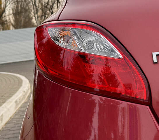 Червоний Мазда 2, об'ємом двигуна 1.5 л та пробігом 138 тис. км за 6800 $, фото 32 на Automoto.ua