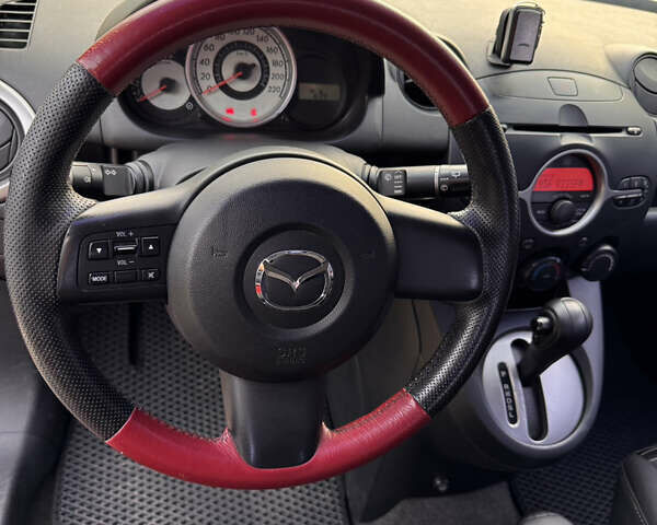 Червоний Мазда 2, об'ємом двигуна 1.5 л та пробігом 138 тис. км за 6800 $, фото 25 на Automoto.ua