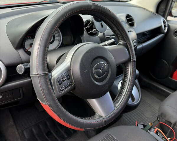 Красный Мазда 2, объемом двигателя 1.5 л и пробегом 208 тыс. км за 6200 $, фото 6 на Automoto.ua