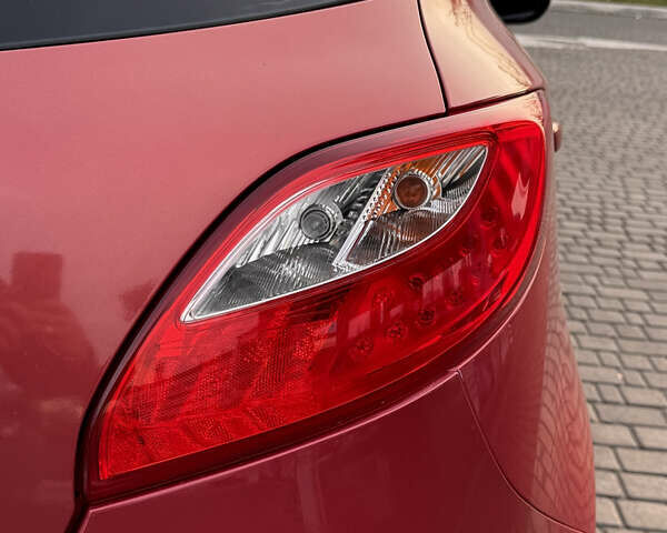 Червоний Мазда 2, об'ємом двигуна 1.5 л та пробігом 138 тис. км за 6800 $, фото 31 на Automoto.ua