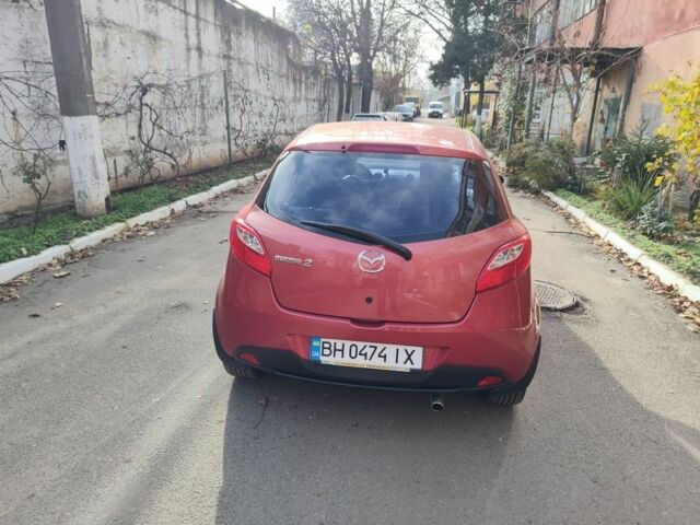 Красный Мазда 2, объемом двигателя 1.5 л и пробегом 138 тыс. км за 6500 $, фото 2 на Automoto.ua