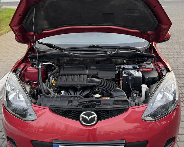 Червоний Мазда 2, об'ємом двигуна 1.5 л та пробігом 138 тис. км за 6800 $, фото 47 на Automoto.ua