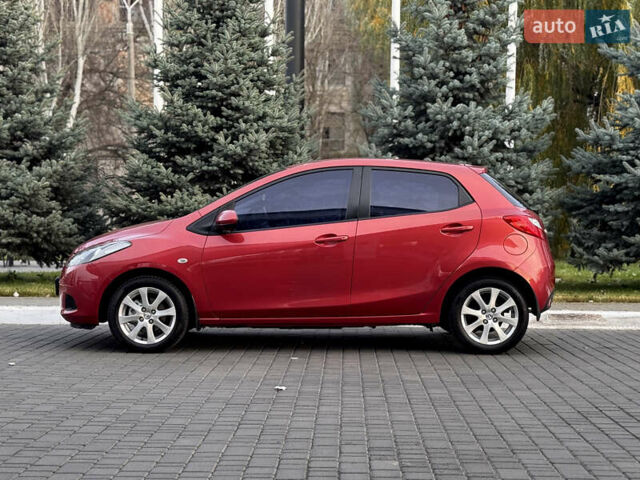 Червоний Мазда 2, об'ємом двигуна 1.5 л та пробігом 138 тис. км за 6800 $, фото 12 на Automoto.ua