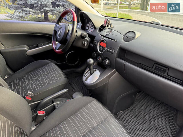 Червоний Мазда 2, об'ємом двигуна 1.5 л та пробігом 138 тис. км за 6800 $, фото 42 на Automoto.ua