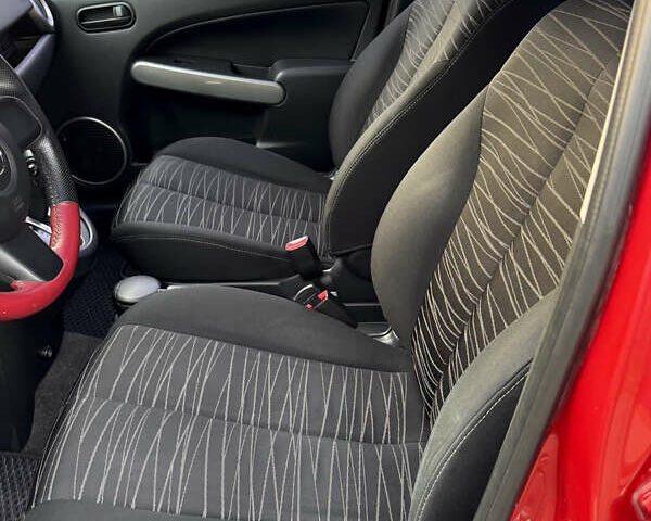 Червоний Мазда 2, об'ємом двигуна 1.5 л та пробігом 138 тис. км за 6800 $, фото 18 на Automoto.ua