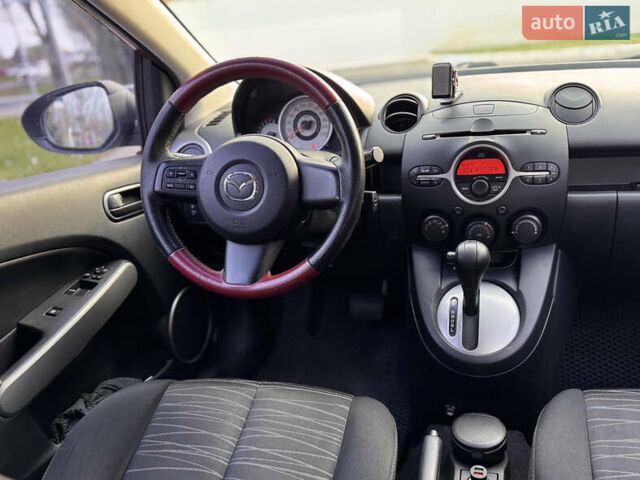 Червоний Мазда 2, об'ємом двигуна 1.5 л та пробігом 138 тис. км за 6800 $, фото 40 на Automoto.ua