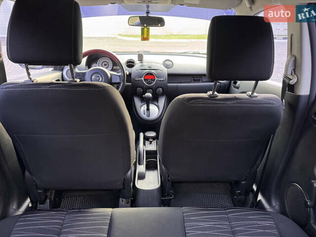 Червоний Мазда 2, об'ємом двигуна 1.5 л та пробігом 138 тис. км за 6800 $, фото 27 на Automoto.ua