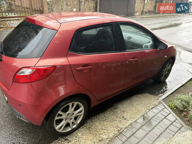 Красный Мазда 2, объемом двигателя 1.5 л и пробегом 109 тыс. км за 7100 $, фото 3 на Automoto.ua