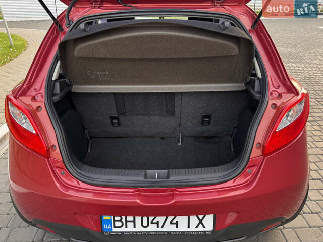 Червоний Мазда 2, об'ємом двигуна 1.5 л та пробігом 138 тис. км за 6800 $, фото 29 на Automoto.ua