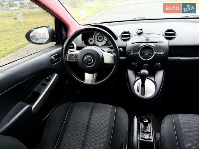 Красный Мазда 2, объемом двигателя 1.5 л и пробегом 165 тыс. км за 6650 $, фото 13 на Automoto.ua