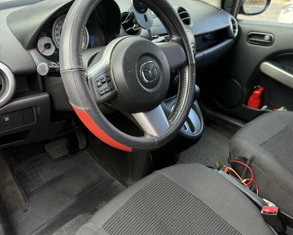 Красный Мазда 2, объемом двигателя 1.5 л и пробегом 208 тыс. км за 6200 $, фото 4 на Automoto.ua