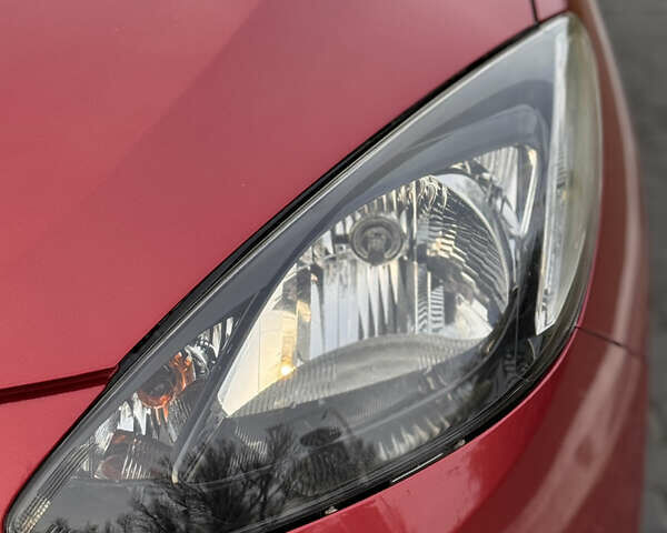 Червоний Мазда 2, об'ємом двигуна 1.5 л та пробігом 138 тис. км за 6800 $, фото 39 на Automoto.ua