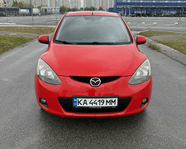 Красный Мазда 2, объемом двигателя 1.5 л и пробегом 165 тыс. км за 6650 $, фото 1 на Automoto.ua