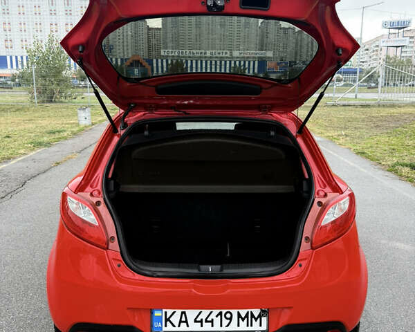 Красный Мазда 2, объемом двигателя 1.5 л и пробегом 165 тыс. км за 6650 $, фото 17 на Automoto.ua