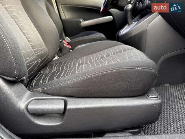 Червоний Мазда 2, об'ємом двигуна 1.5 л та пробігом 138 тис. км за 6800 $, фото 45 на Automoto.ua