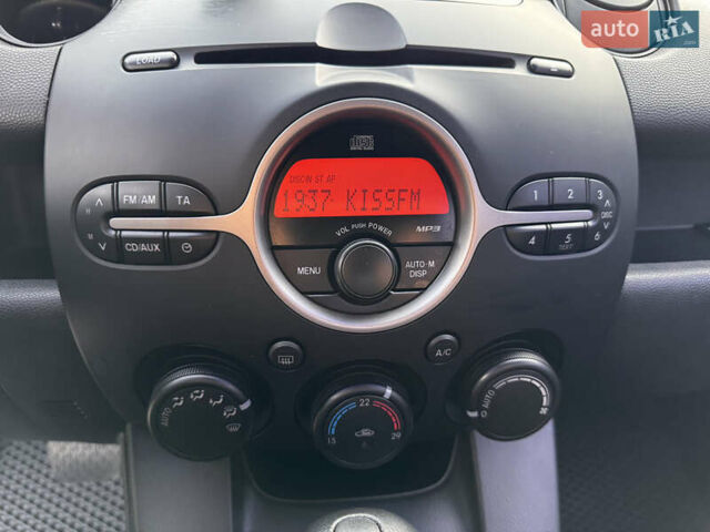 Червоний Мазда 2, об'ємом двигуна 1.5 л та пробігом 138 тис. км за 6800 $, фото 22 на Automoto.ua