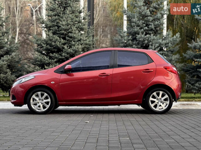 Червоний Мазда 2, об'ємом двигуна 1.5 л та пробігом 138 тис. км за 6800 $, фото 5 на Automoto.ua
