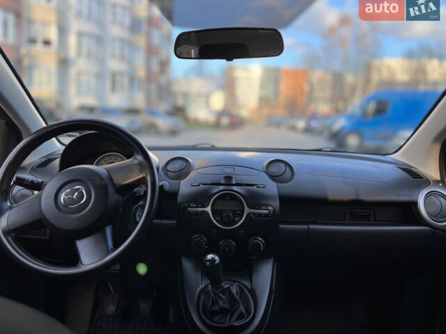 Червоний Мазда 2, об'ємом двигуна 1.4 л та пробігом 110 тис. км за 5180 $, фото 6 на Automoto.ua