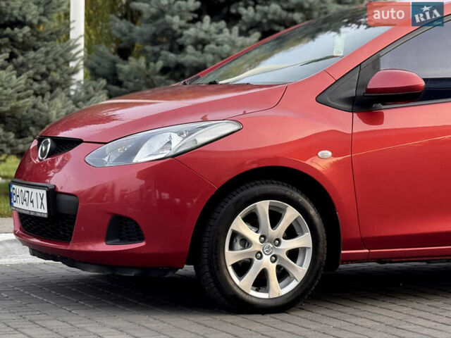 Червоний Мазда 2, об'ємом двигуна 1.5 л та пробігом 138 тис. км за 6800 $, фото 15 на Automoto.ua