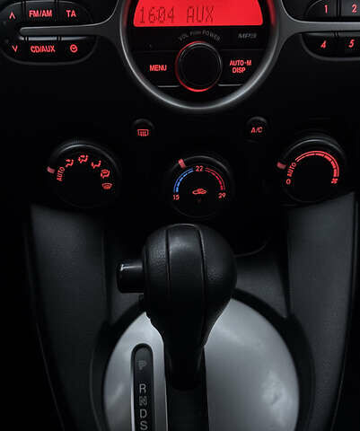 Красный Мазда 2, объемом двигателя 1.5 л и пробегом 109 тыс. км за 7100 $, фото 10 на Automoto.ua