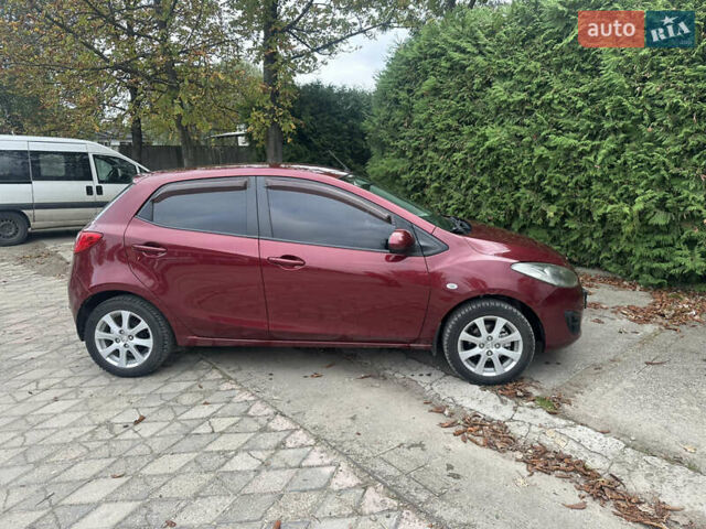 Червоний Мазда 2, об'ємом двигуна 1.5 л та пробігом 112 тис. км за 7100 $, фото 3 на Automoto.ua