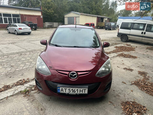 Червоний Мазда 2, об'ємом двигуна 1.5 л та пробігом 112 тис. км за 7100 $, фото 1 на Automoto.ua