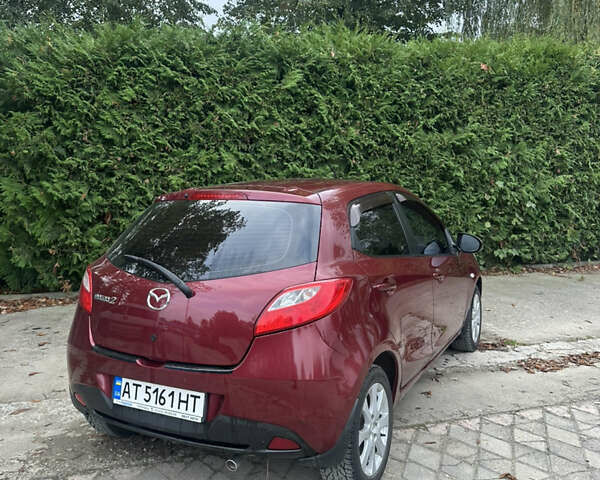 Червоний Мазда 2, об'ємом двигуна 1.5 л та пробігом 112 тис. км за 7100 $, фото 4 на Automoto.ua