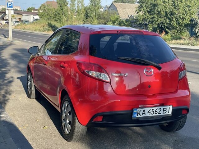 Красный Мазда 2, объемом двигателя 1.5 л и пробегом 90 тыс. км за 6599 $, фото 5 на Automoto.ua