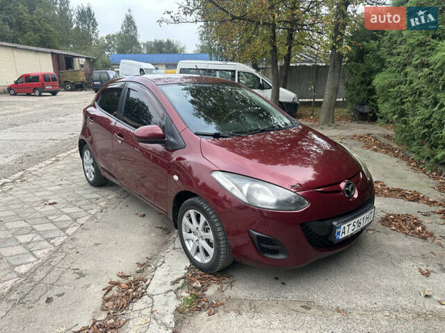 Червоний Мазда 2, об'ємом двигуна 1.5 л та пробігом 112 тис. км за 7100 $, фото 2 на Automoto.ua