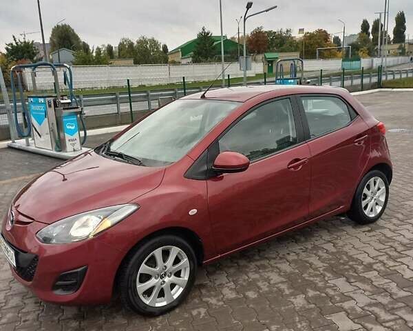 Мазда 2 2014 в Киеве на Automoto.ua Красный Мазда 2, объемом двигателя 1.5 л и пробегом 81 тыс. км за 9000 $, фото 1 на Automoto.ua