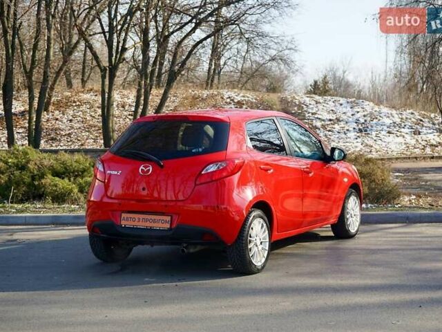 Красный Мазда 2, объемом двигателя 1.3 л и пробегом 130 тыс. км за 5400 $, фото 4 на Automoto.ua