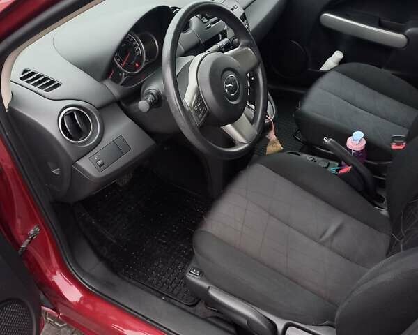 Мазда 2 2014 в Киеве на Automoto.ua Красный Мазда 2, объемом двигателя 1.5 л и пробегом 81 тыс. км за 9000 $, фото 4 на Automoto.ua