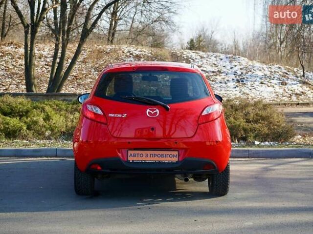 Красный Мазда 2, объемом двигателя 1.3 л и пробегом 130 тыс. км за 5400 $, фото 5 на Automoto.ua