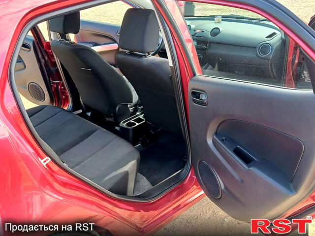 Красный Мазда 2, объемом двигателя 1.5 л и пробегом 52 тыс. км за 7900 $, фото 8 на Automoto.ua