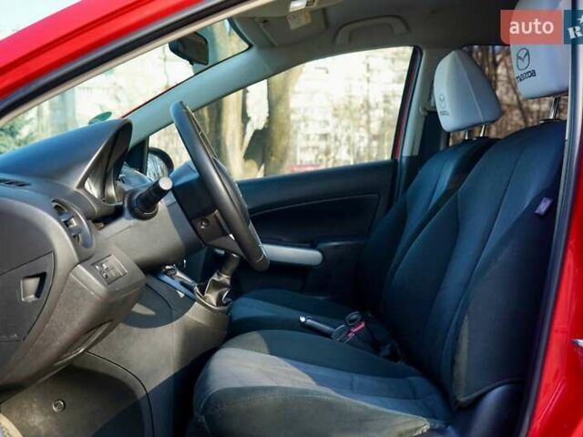 Красный Мазда 2, объемом двигателя 1.3 л и пробегом 130 тыс. км за 5400 $, фото 16 на Automoto.ua