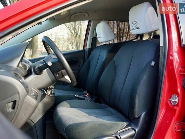 Красный Мазда 2, объемом двигателя 1.3 л и пробегом 130 тыс. км за 5400 $, фото 17 на Automoto.ua