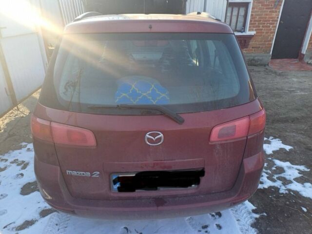 Красный Мазда 2, объемом двигателя 1.3 л и пробегом 164 тыс. км за 3500 $, фото 6 на Automoto.ua