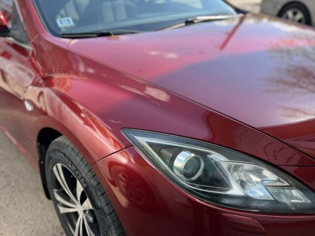 Красный Мазда 2, объемом двигателя 2 л и пробегом 224 тыс. км за 6700 $, фото 4 на Automoto.ua