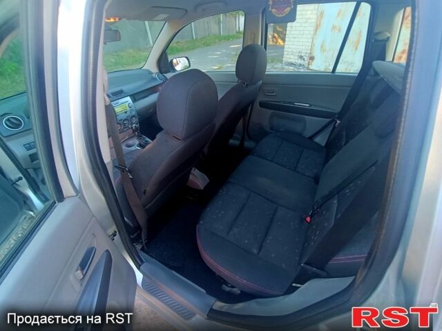 Мазда 2, объемом двигателя 1.4 л и пробегом 245 тыс. км за 1399 $, фото 5 на Automoto.ua