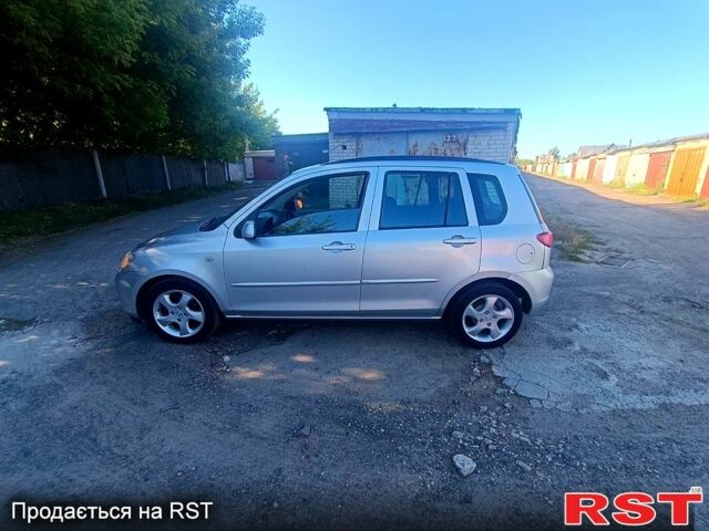 Мазда 2, объемом двигателя 1.4 л и пробегом 245 тыс. км за 1399 $, фото 2 на Automoto.ua