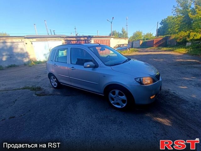 Мазда 2, объемом двигателя 1.4 л и пробегом 245 тыс. км за 1399 $, фото 1 на Automoto.ua
