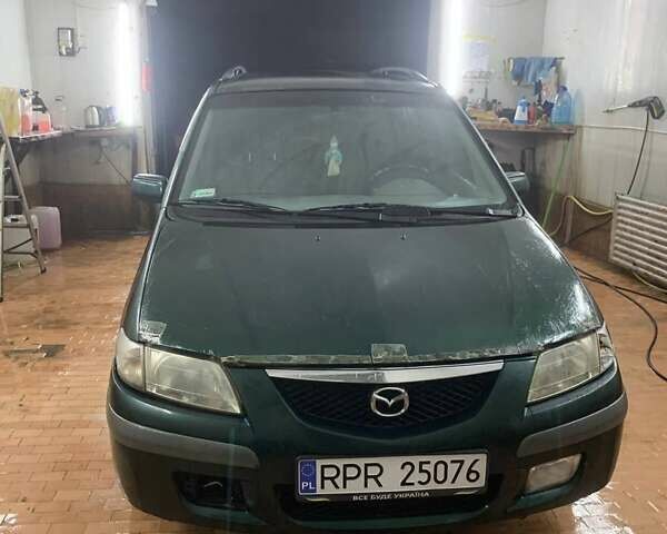 Мазда 2, объемом двигателя 2 л и пробегом 300 тыс. км за 900 $, фото 2 на Automoto.ua