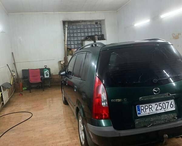 Мазда 2, объемом двигателя 2 л и пробегом 300 тыс. км за 900 $, фото 4 на Automoto.ua