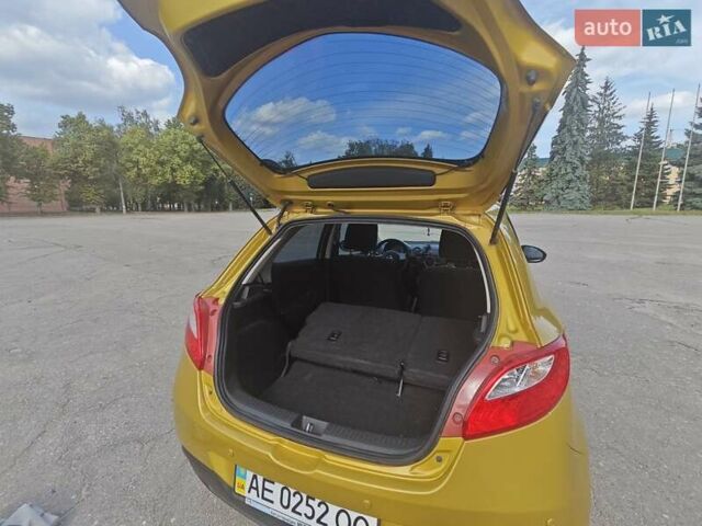 Жовтий Мазда 2, об'ємом двигуна 1.5 л та пробігом 74 тис. км за 5600 $, фото 16 на Automoto.ua