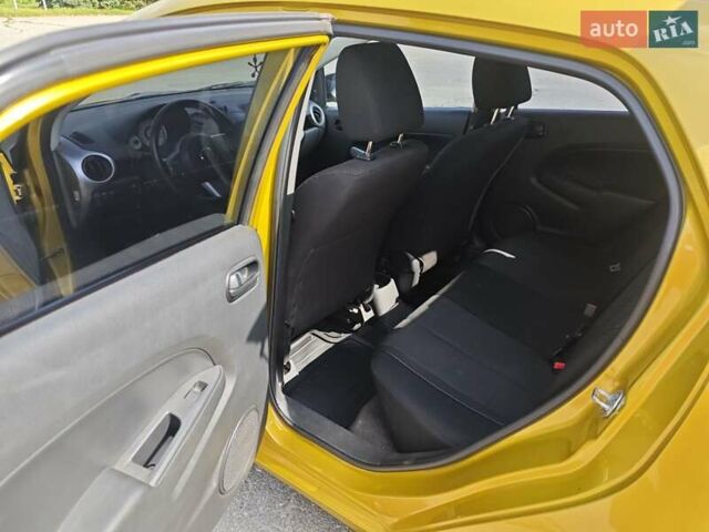 Жовтий Мазда 2, об'ємом двигуна 1.5 л та пробігом 74 тис. км за 5600 $, фото 14 на Automoto.ua