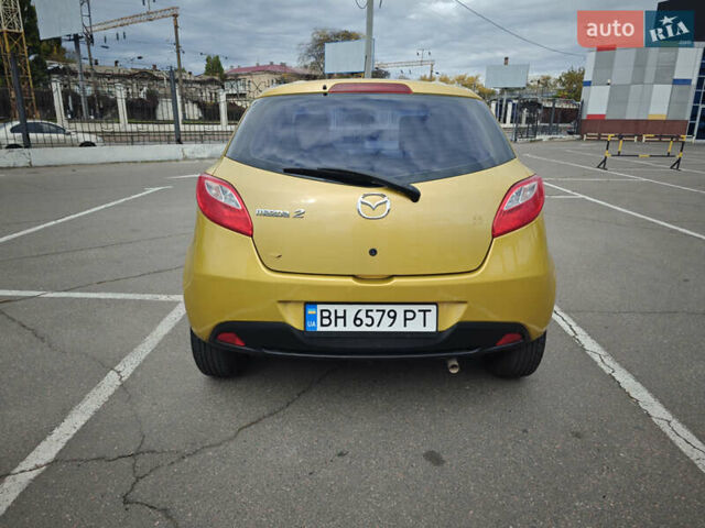 Жовтий Мазда 2, об'ємом двигуна 1.5 л та пробігом 103 тис. км за 6200 $, фото 12 на Automoto.ua